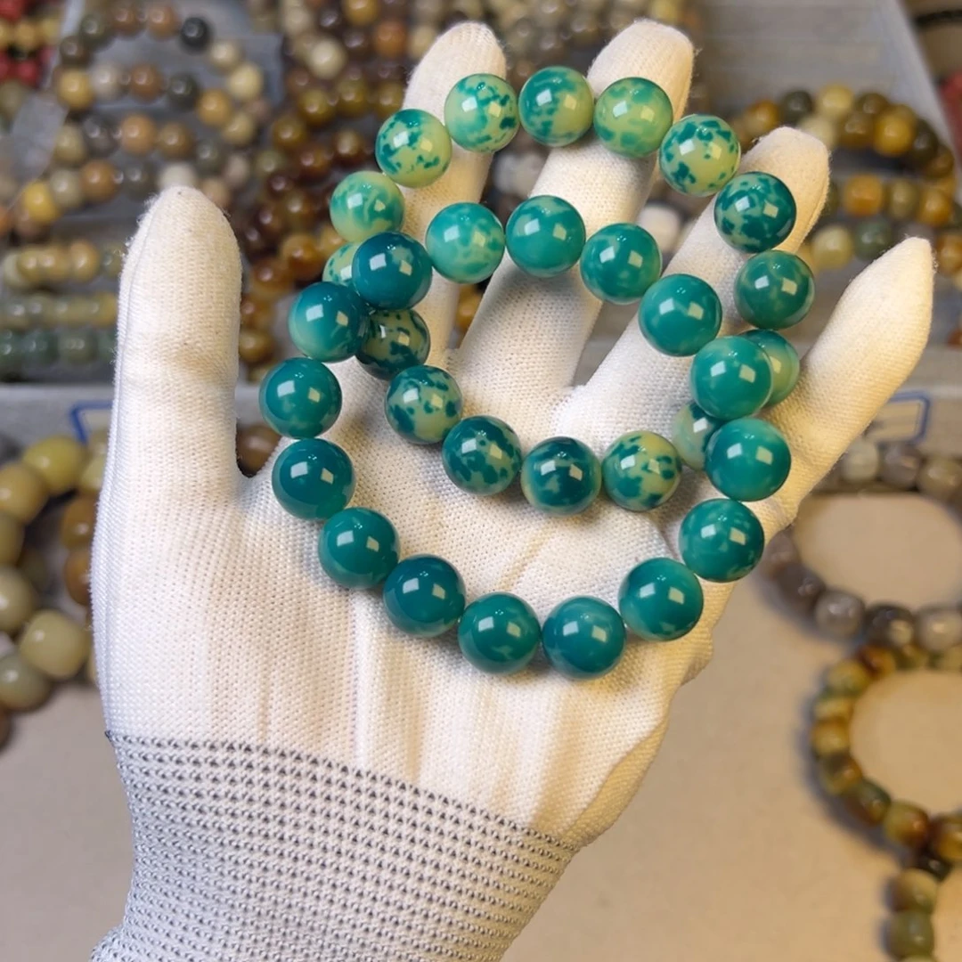 菩提根/象牙果手串蓝色瓜瓜卡13左右