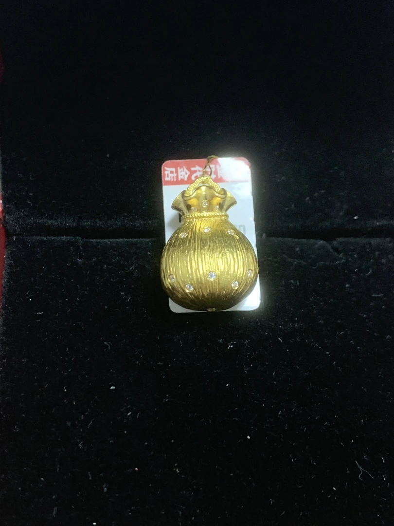【世纪金时代】净重11.24克足金点钻福袋吊坠