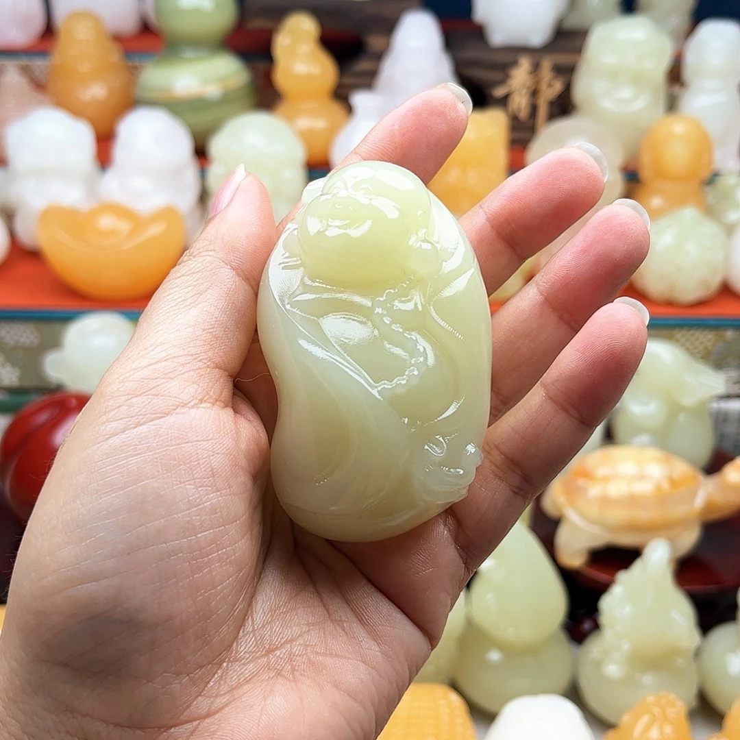 心***顺石材大肚佛手把件