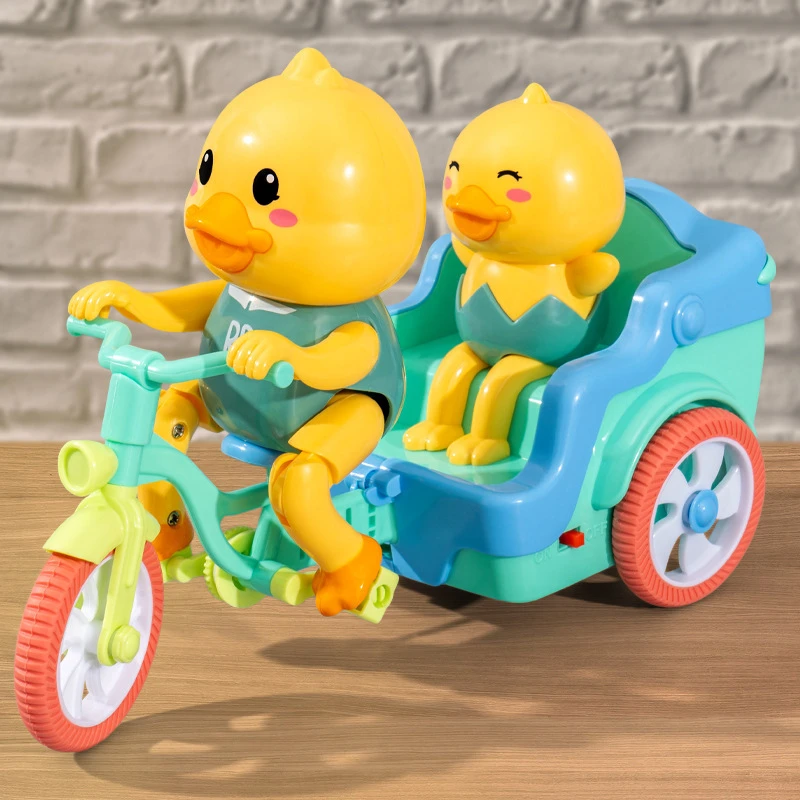 幼儿电动小鸭子踩三轮车玩具带动感音乐灯光卡通儿童旋转特技车