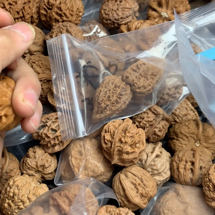 爱***生吊坠文玩核桃塔尖，狮子头，