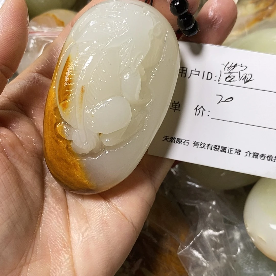 石材浩****司古青石手把件