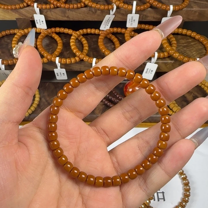 杨***备手串橄榄核5.5mm 老挝核核尖全品