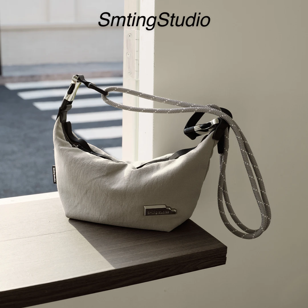 Smting西木汀斜挎包轻运动防水单肩饺子包女2025手提包休闲通勤