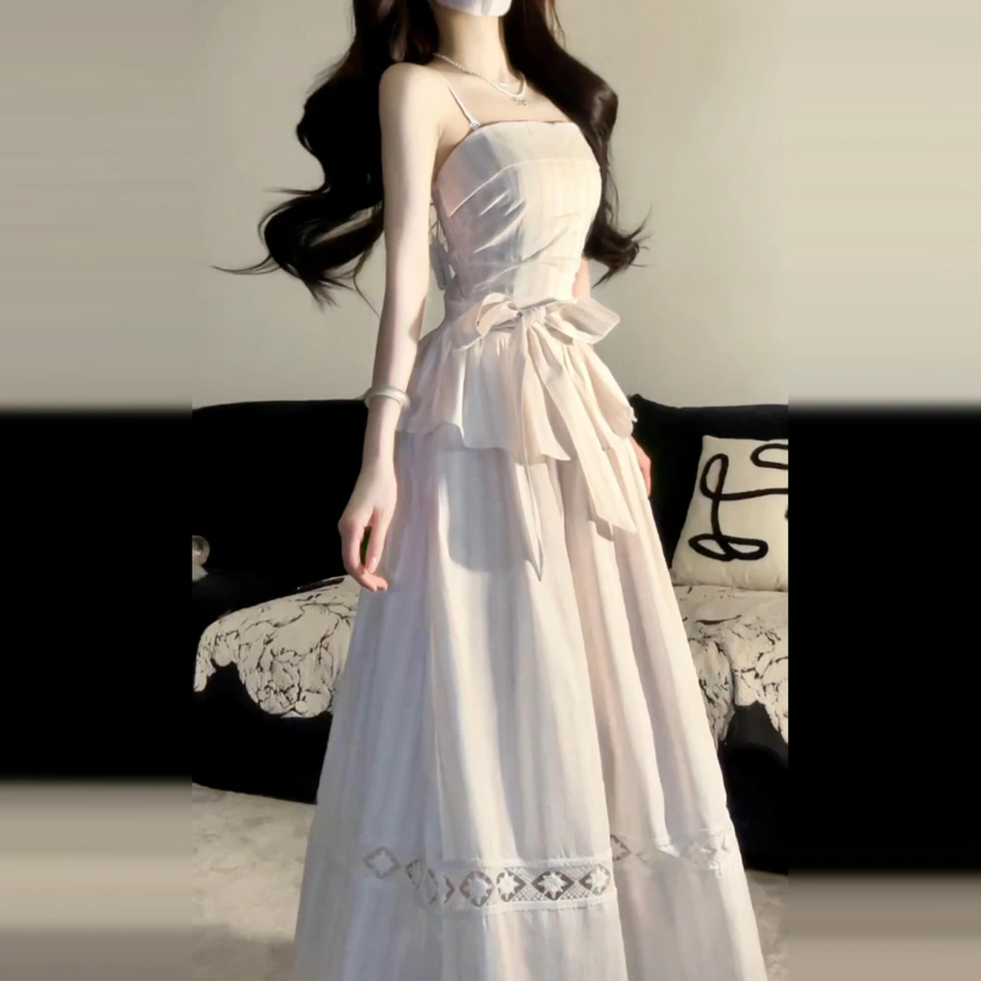 假两件粉色条纹抹胸连衣裙子女夏季2025新款海边度假独特漂亮长裙