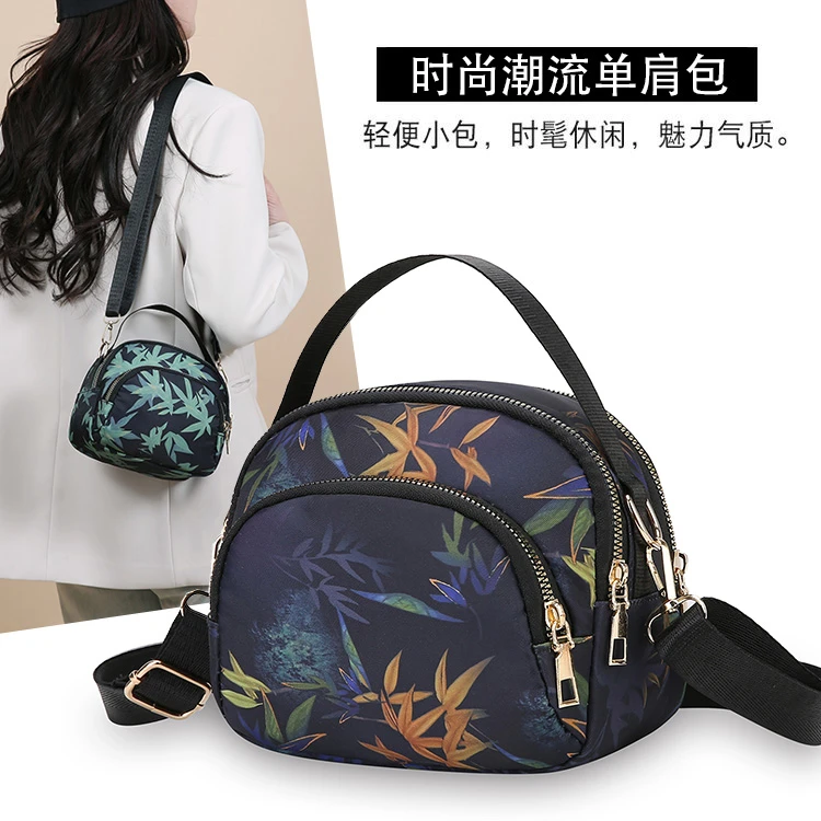 简约斜挎包水洗卡位可调节拉链放手机手掌包百搭