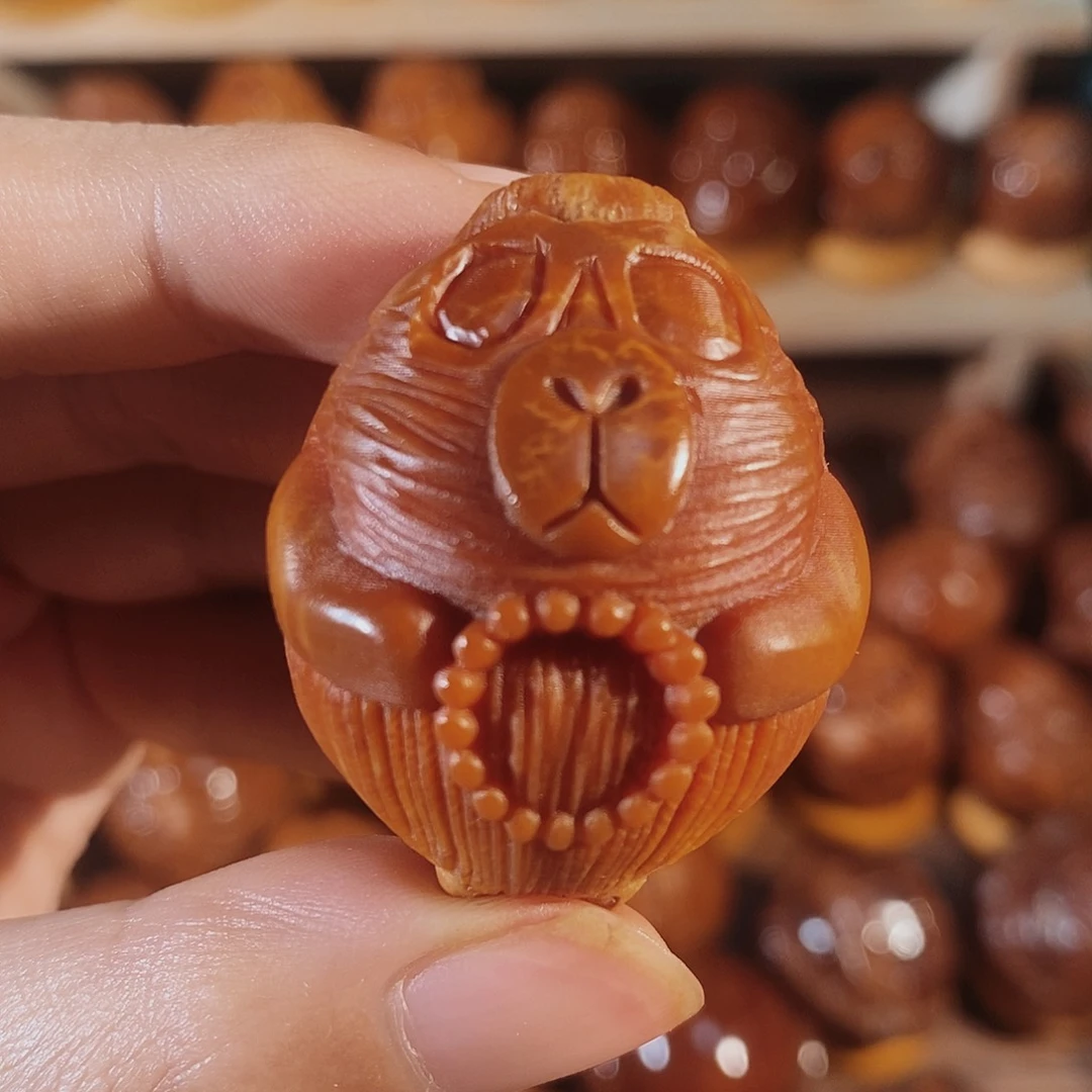 橄榄核把件卡皮巴拉