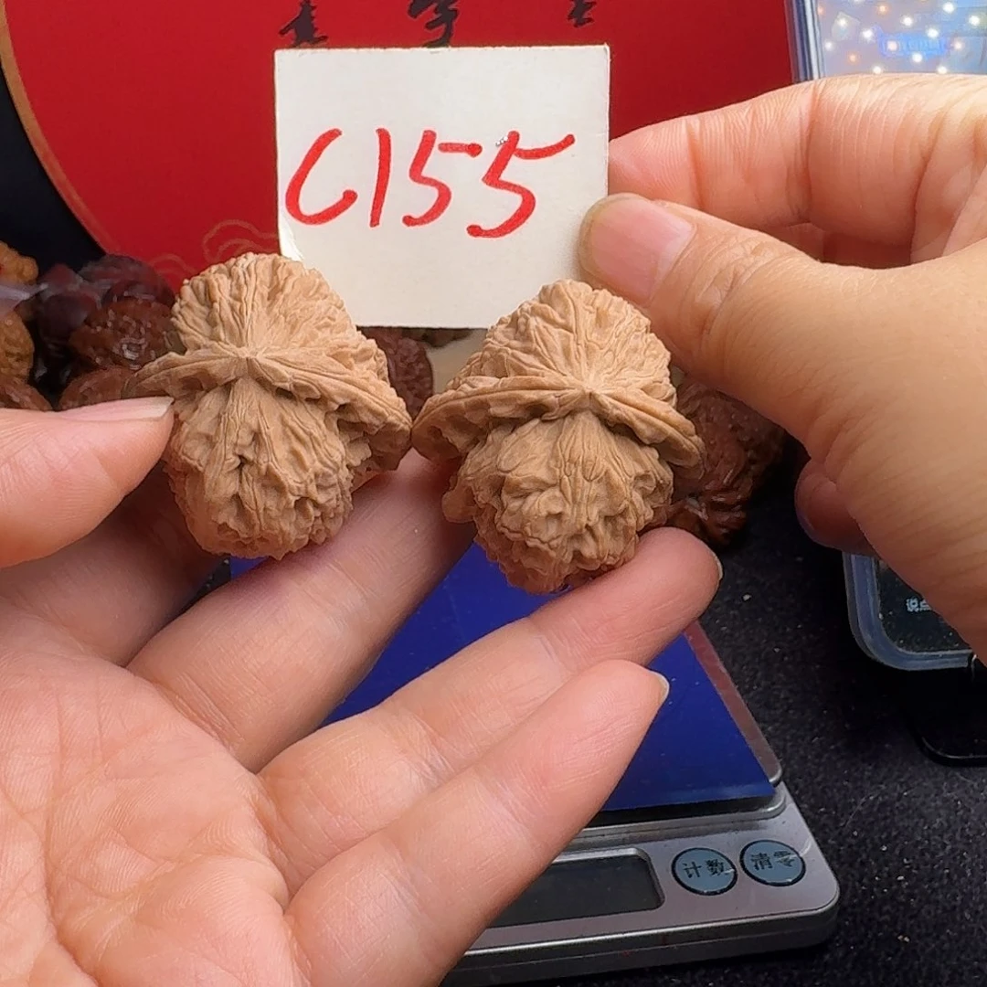 文玩核桃把件三角白狮子头40