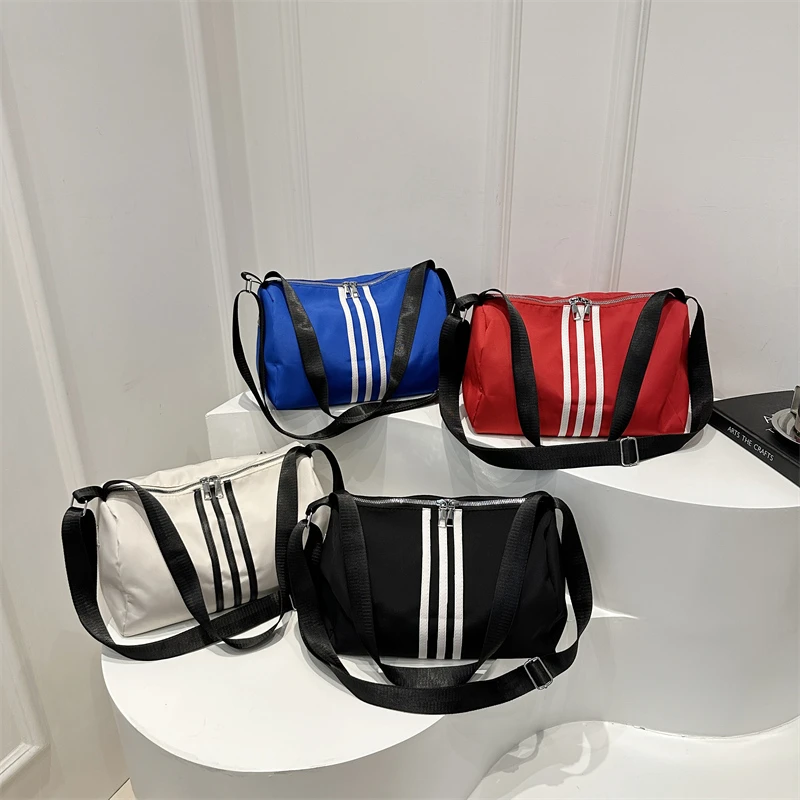 休闲百搭包包女2025新款时尚简约牛津布单肩包网红洋气斜挎托特包