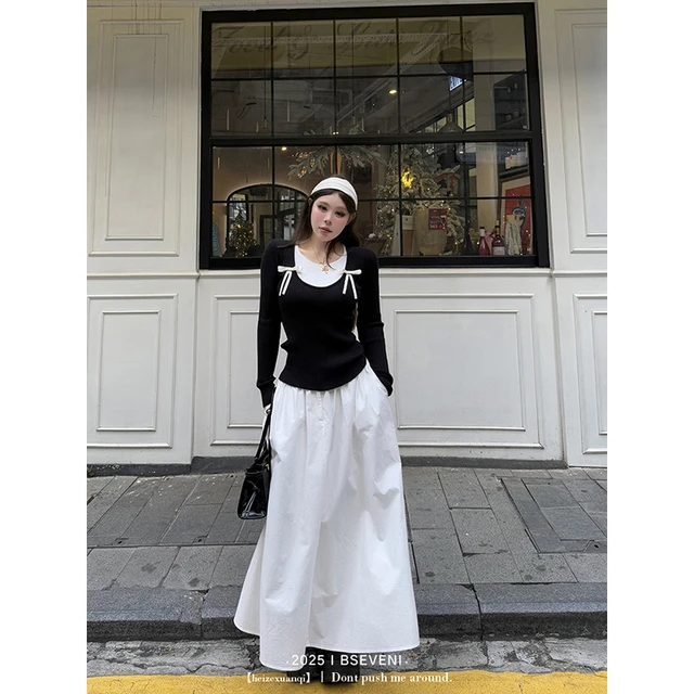 黑泽玄七微胖mm2025早春新款套装蝴蝶结假两件上衣半身裙两件套女