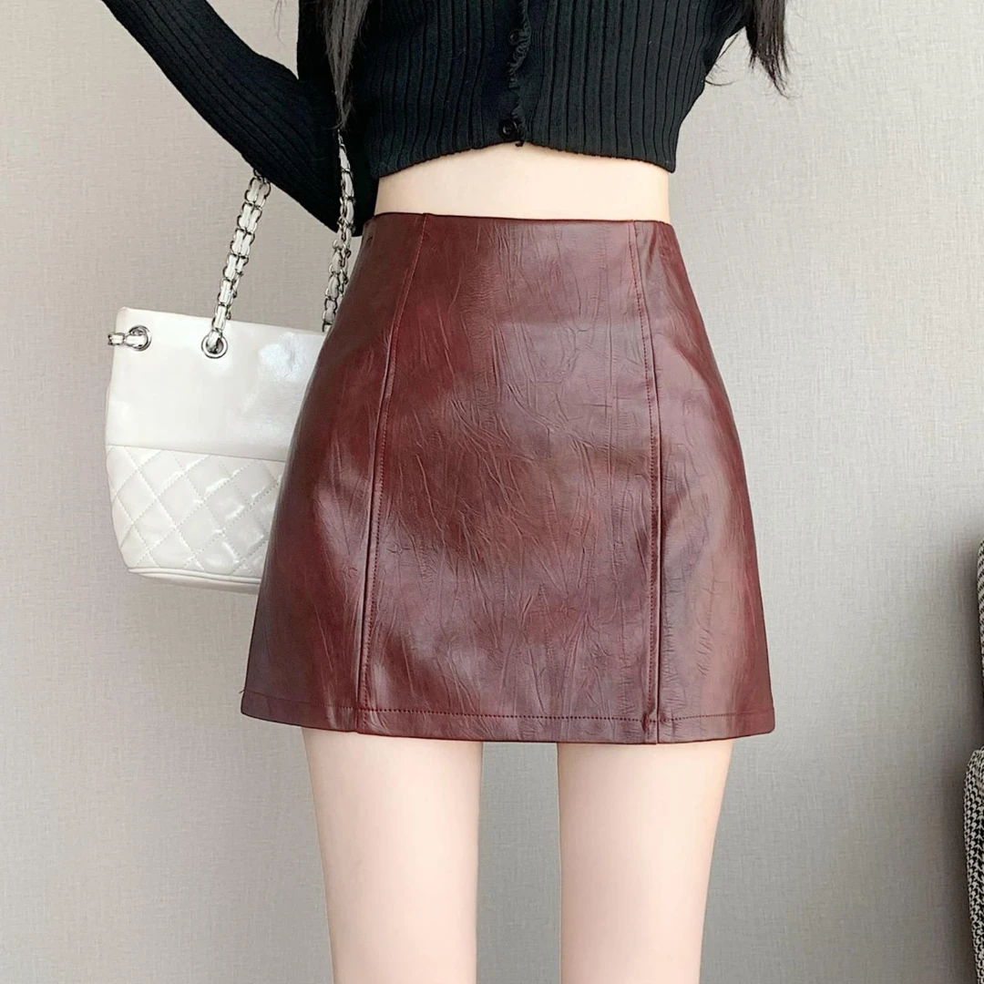 安可拉红包臀半身裙女秋季2025新款PU皮裙高腰显瘦防走光a字短裙