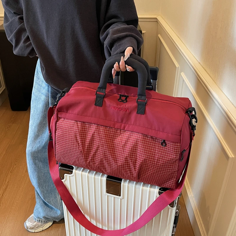 大容量旅行包女时尚轻便手提斜挎运动健身包短途旅游收纳行李袋男