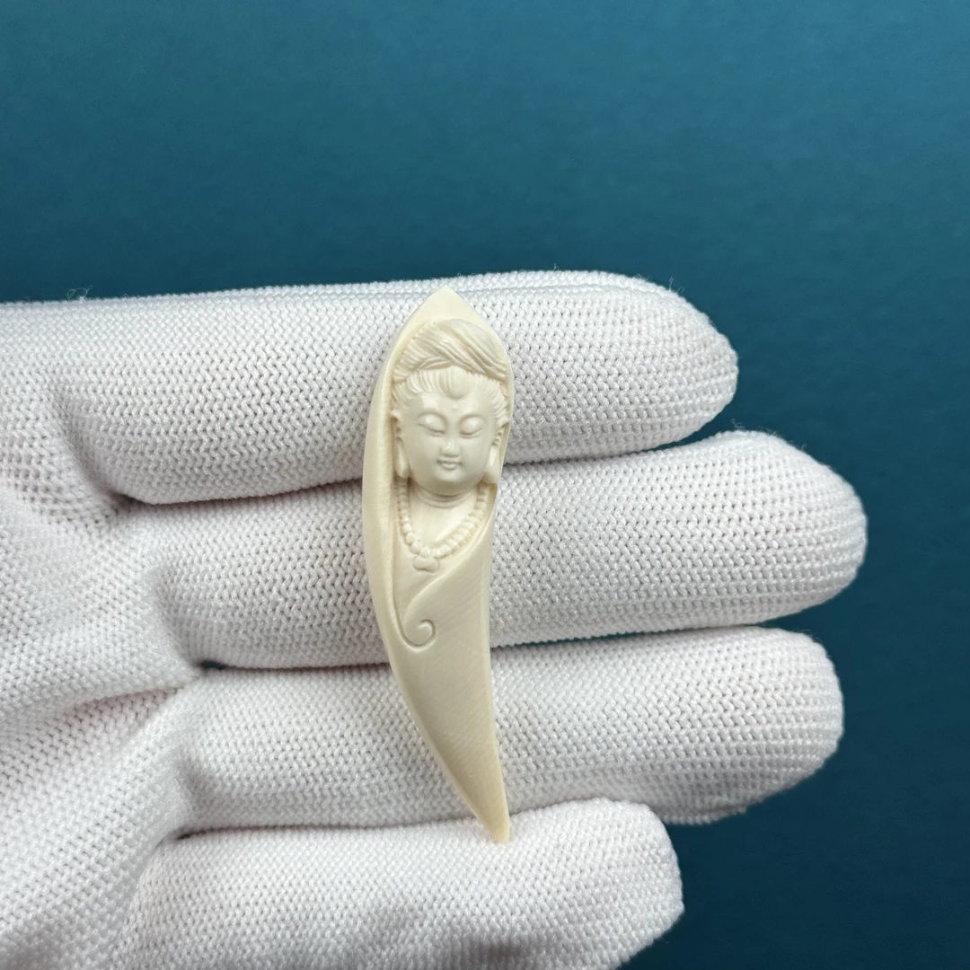 H18-26天然猛犸牙 雕刻观音牙尖 12.6*51.4mm 支持复检假一罚十