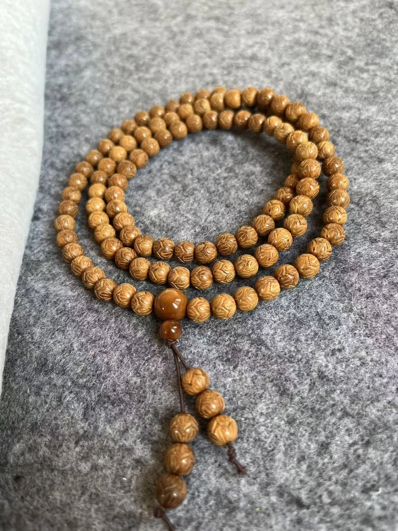 库克精雕莲花0.7长串