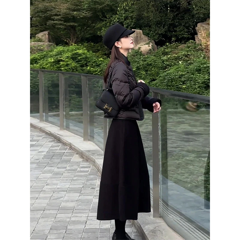 黑色a字毛呢半身裙女秋冬款2025新款冬季鱼尾伞裙小个子加厚裙子