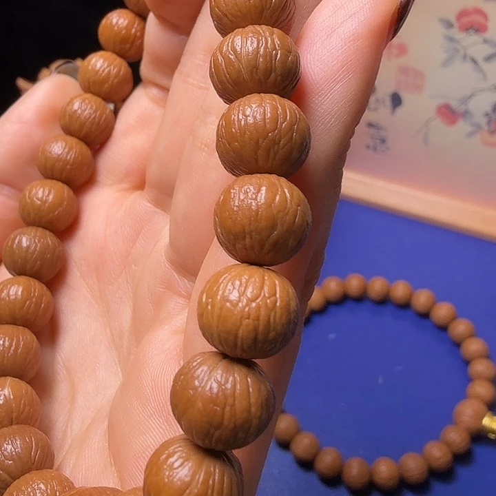 大***熊猴头核桃手串凤羽