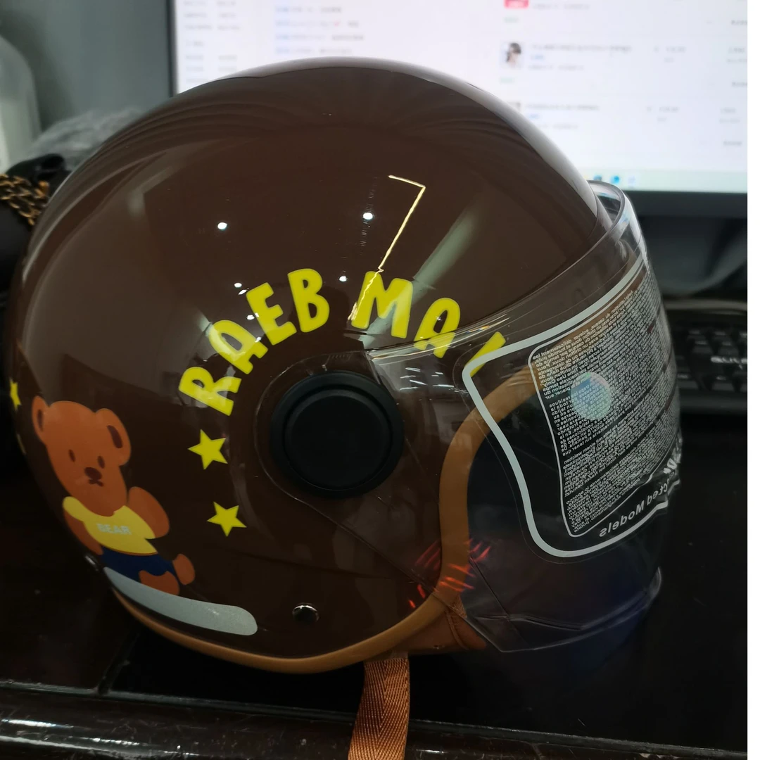 09冬季棕色双镜片瑕疵电动车头盔