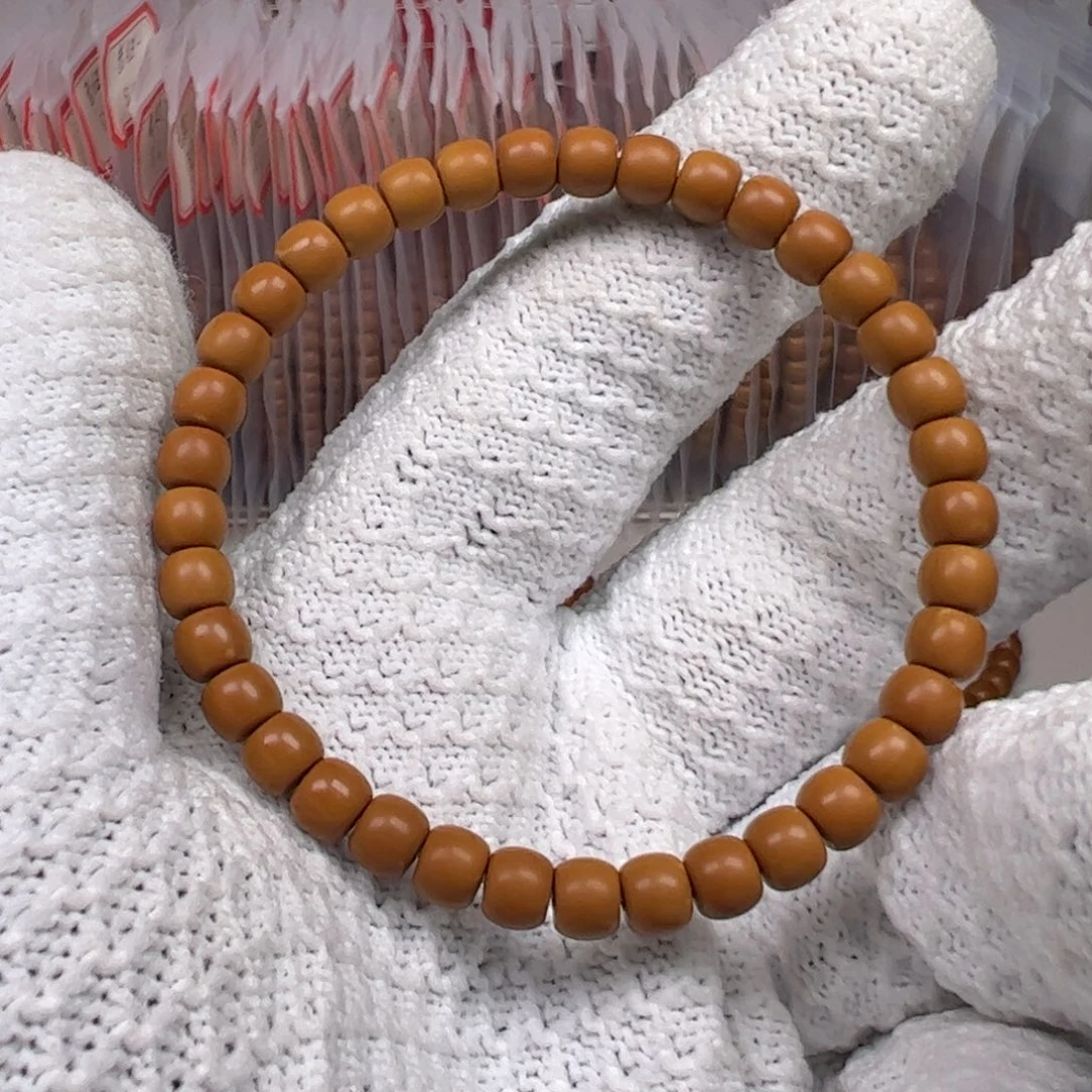 我***人橄榄核吊坠老挝核尖单圈6.0mm