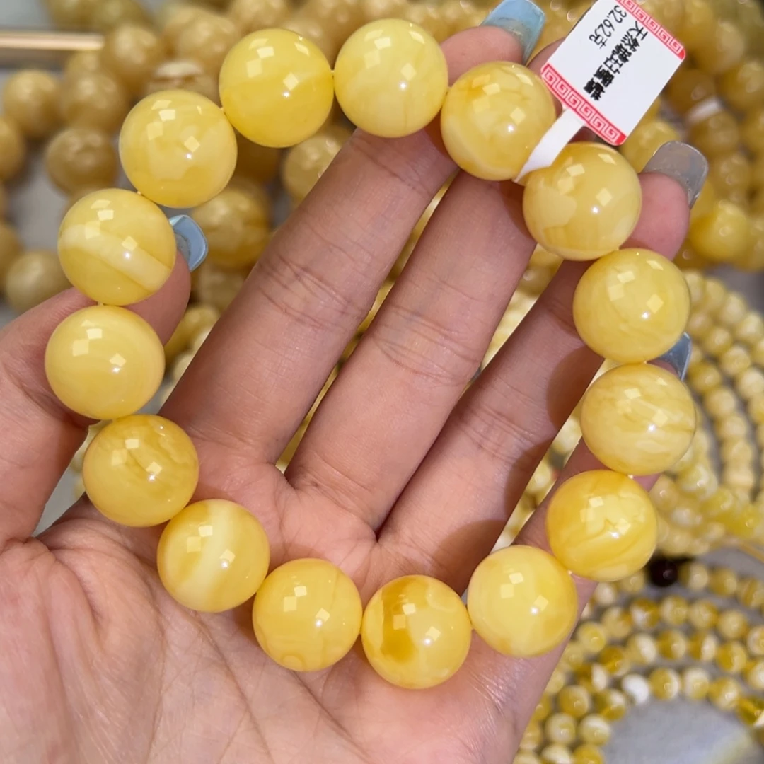 琥珀未镶嵌手链32.7黄白妖花