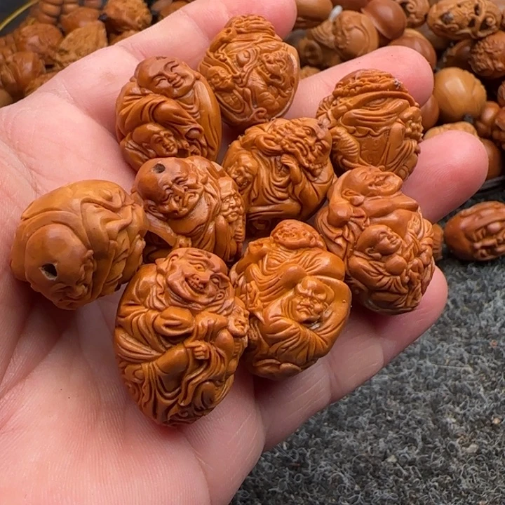 橄榄核手串舂***。橄榄核雕工艺手串