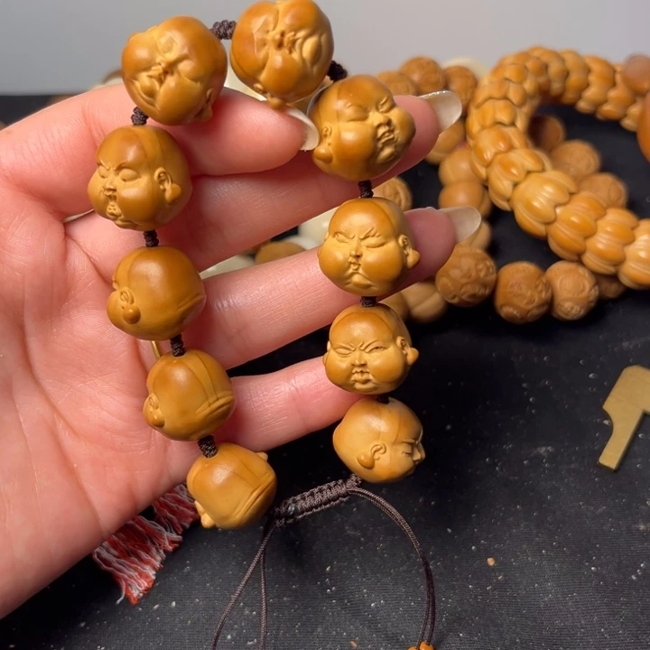 手串橄榄核人生百态