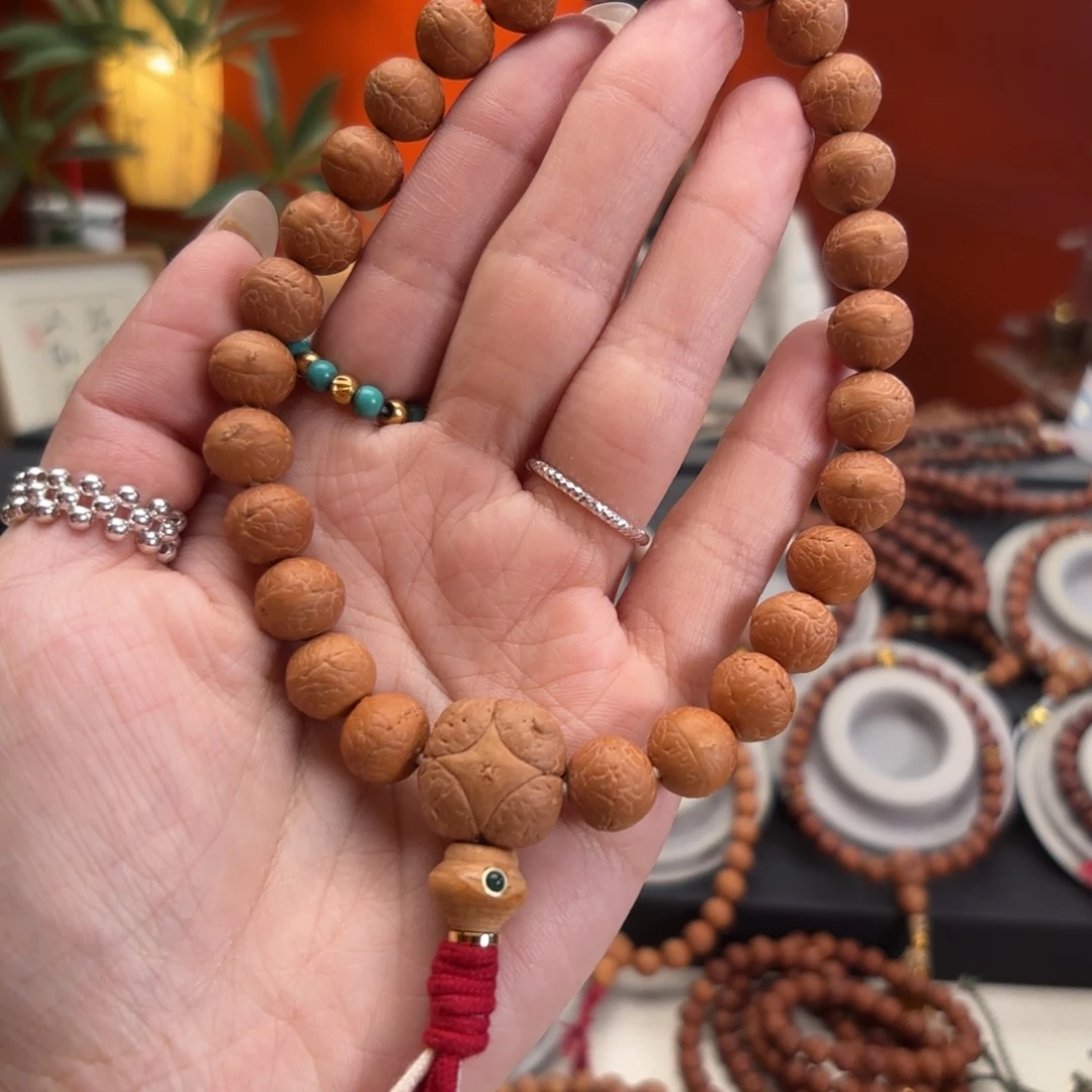 T***崽吊坠凤眼菩提11毫米手持27颗