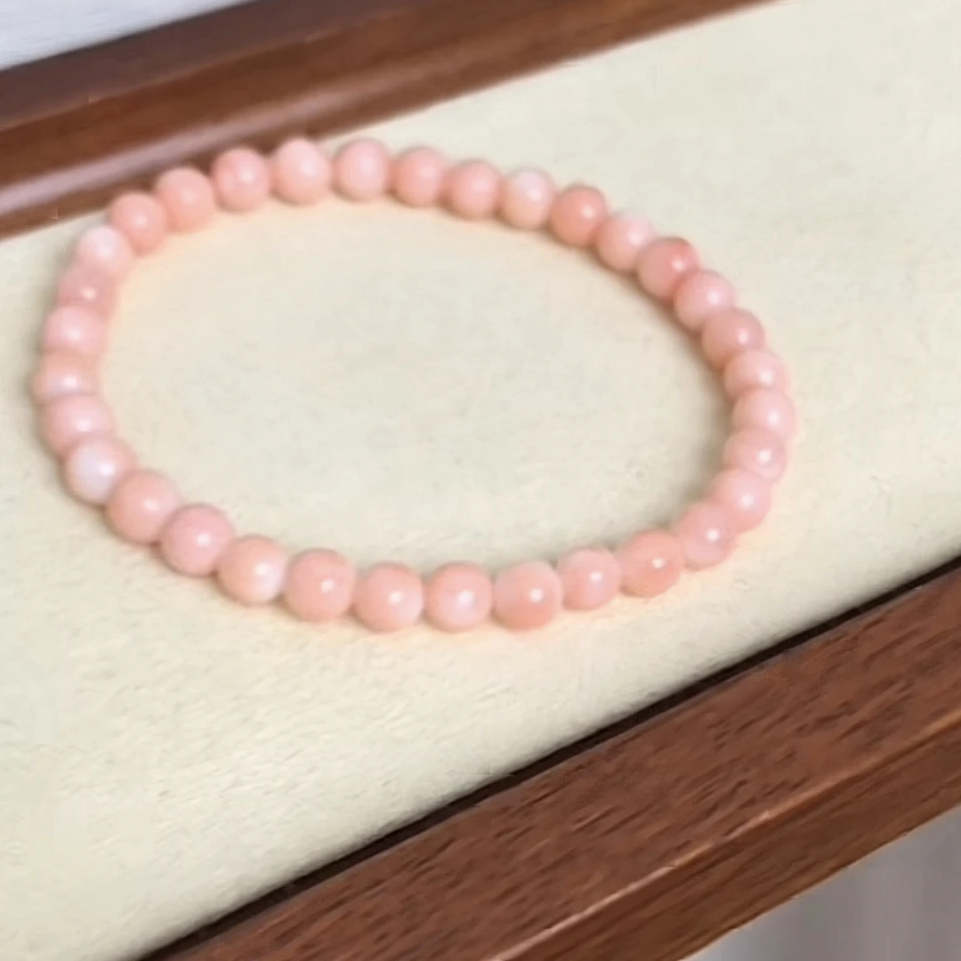 momo珊瑚圆珠手串一条