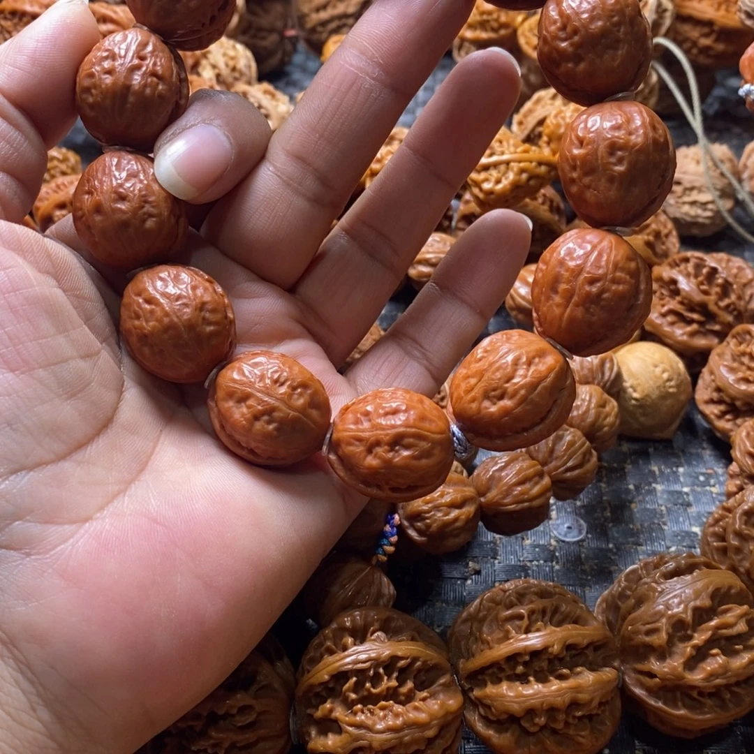 小***.文玩核桃吊坠富甲天下