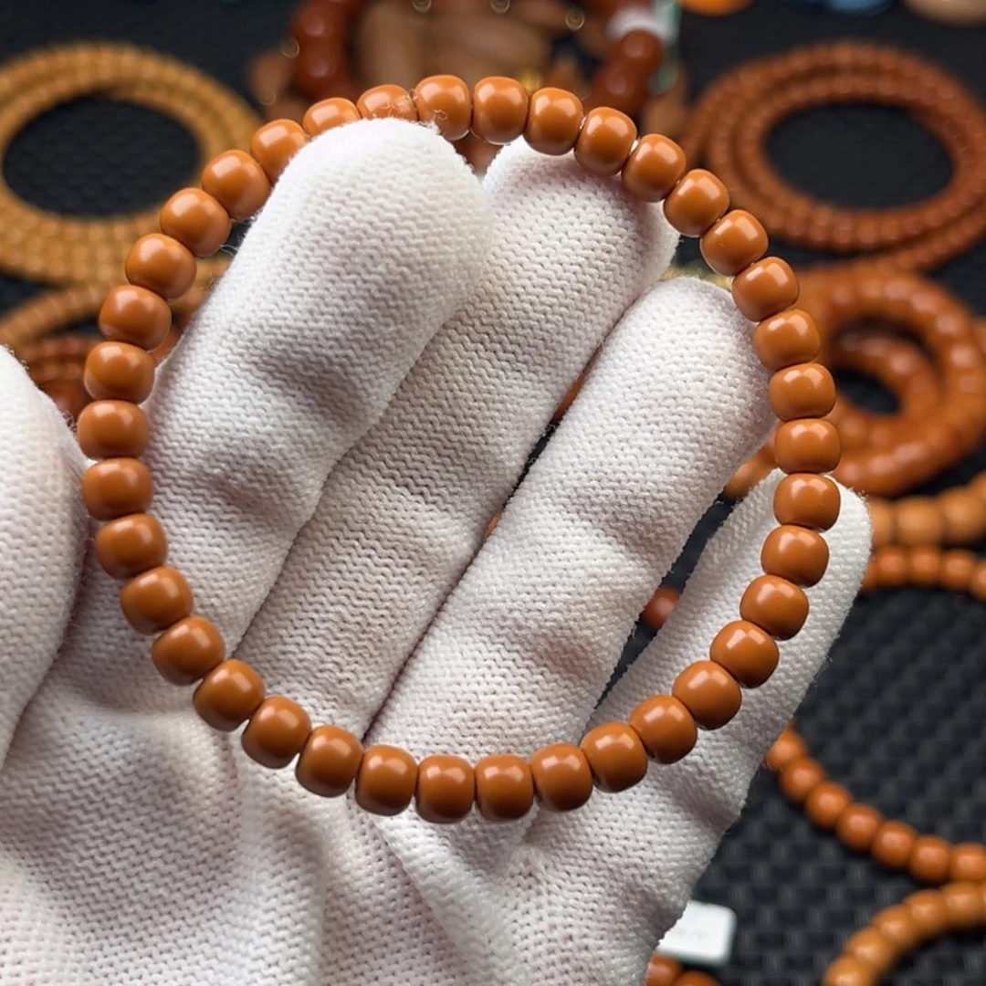 嘿***.橄榄核吊坠6.0mm橄榄核尖老型单圈