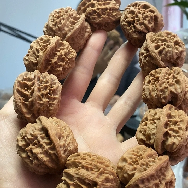 文玩核桃把件38野牛手持