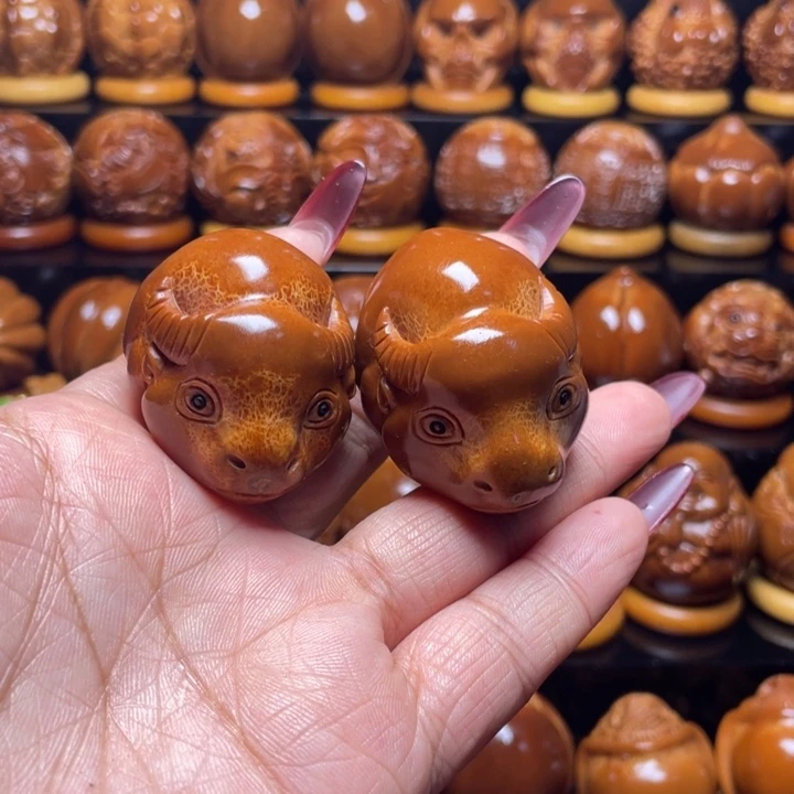 阿***啊橄榄核把件橄榄雕刻