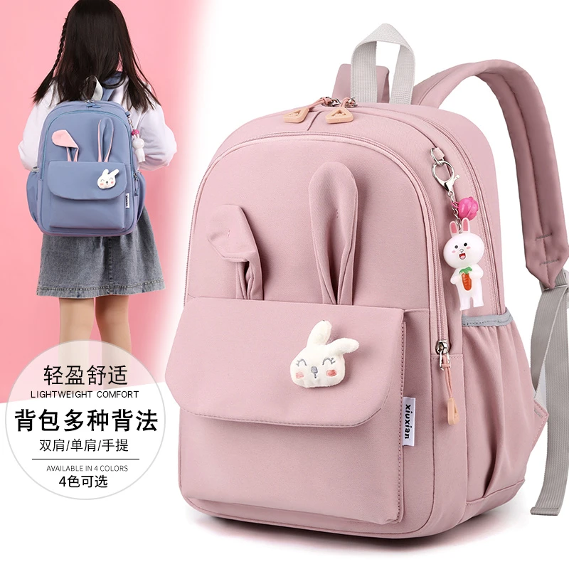 新款书包女小学生1-3-5-6三到六年级减负护脊大容量轻便双肩背包4