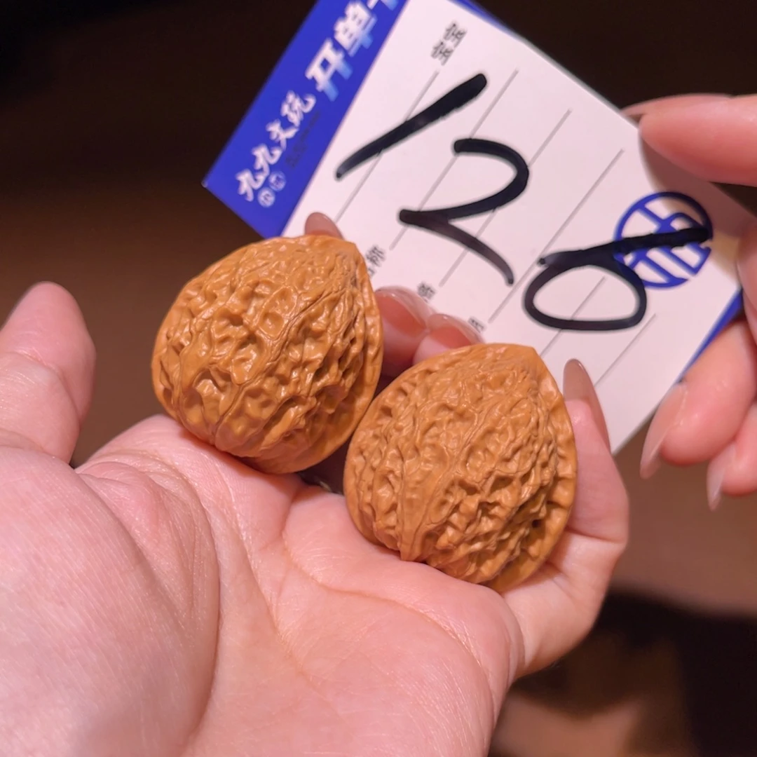 文玩核桃把件34金牛