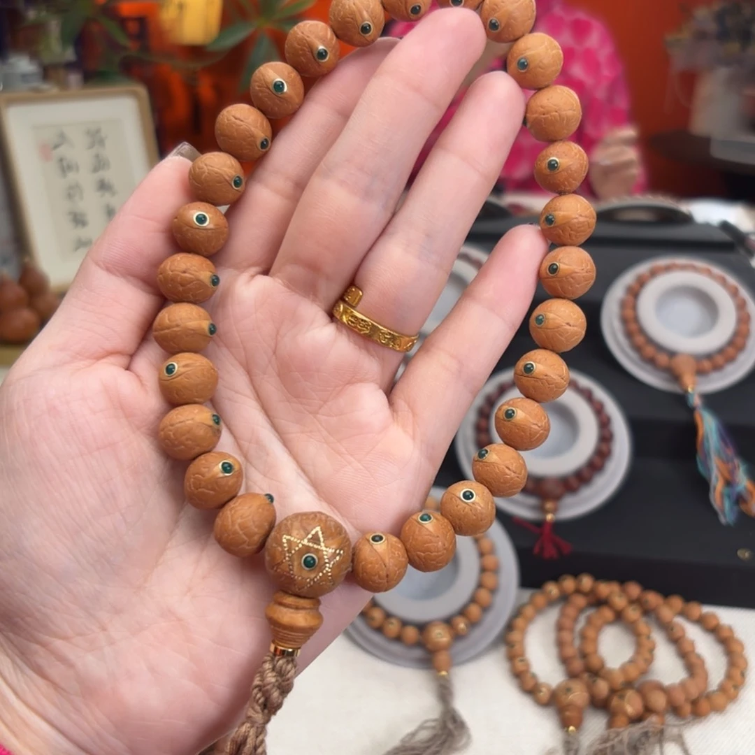 凤眼菩提吊坠12毫米手持玛n