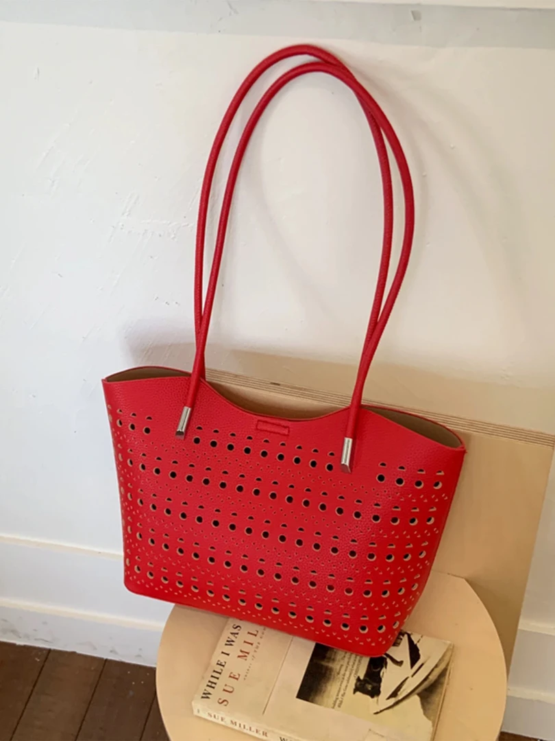 红色小众镂空简约高级感托特包包女通勤水桶包百搭腋下手提子母包