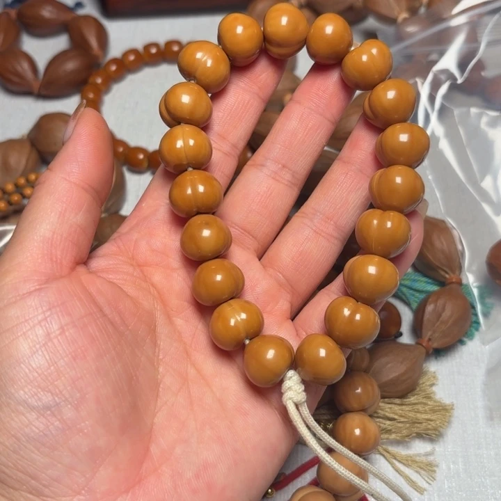 钮***桉橄榄核手串/手链1.55屁桃