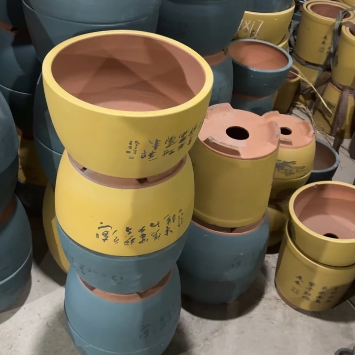 紫砂花盆100-4。     23两个29两个黄