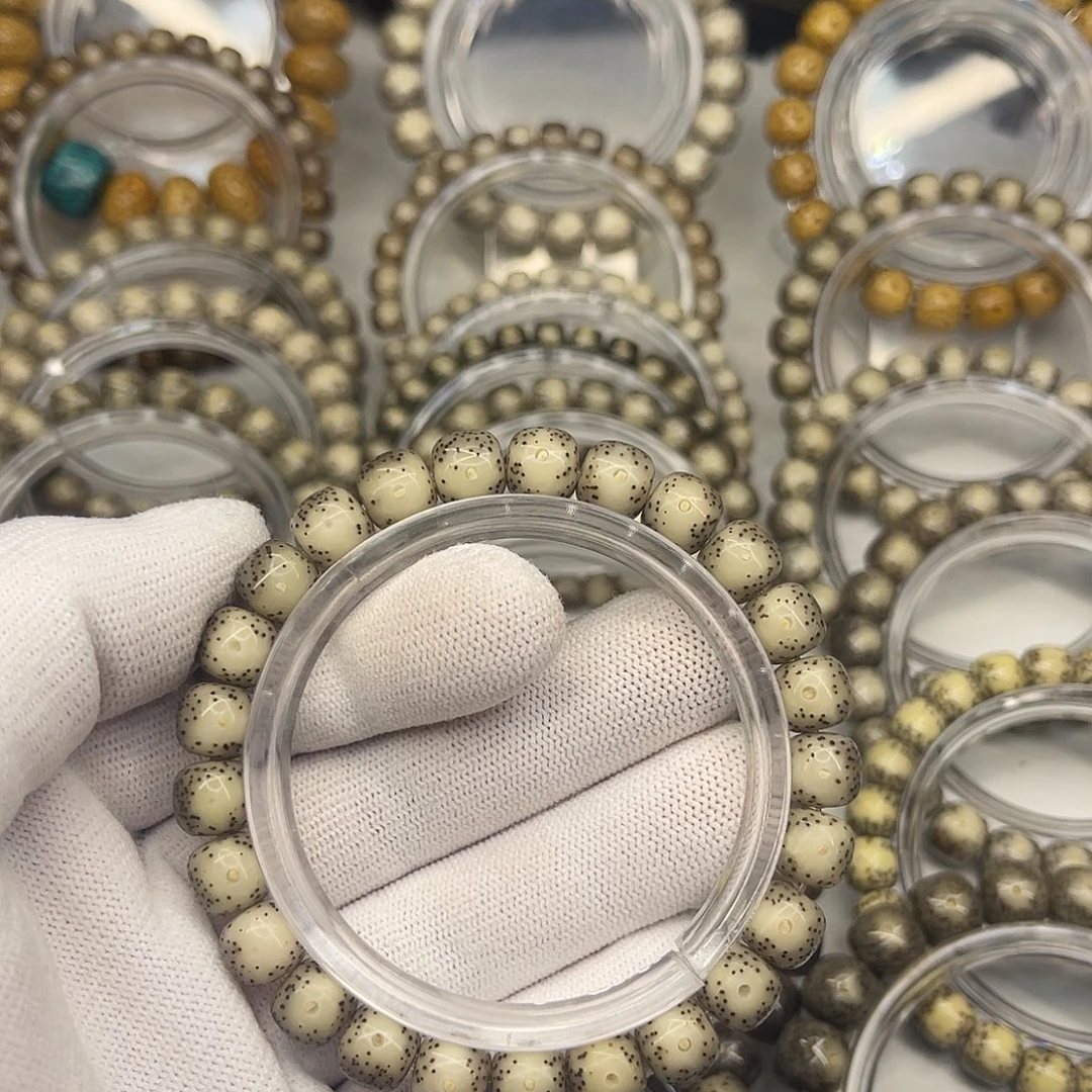 悟***手串星月菩提海南星月菩提石玉料9×8糯冰大留白小细星