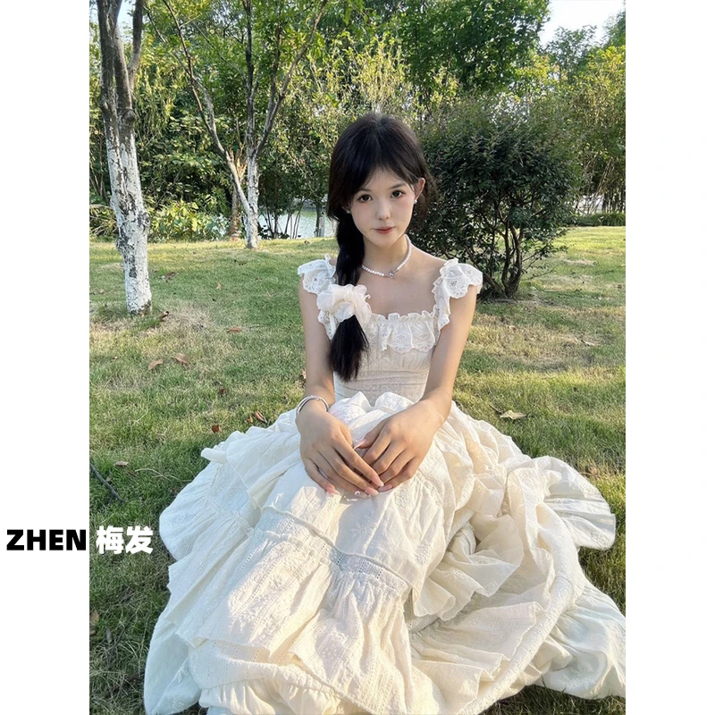 小飞袖吊带连衣裙女蕾丝拼接大裙摆收腰海边度假超仙中长款蛋糕裙