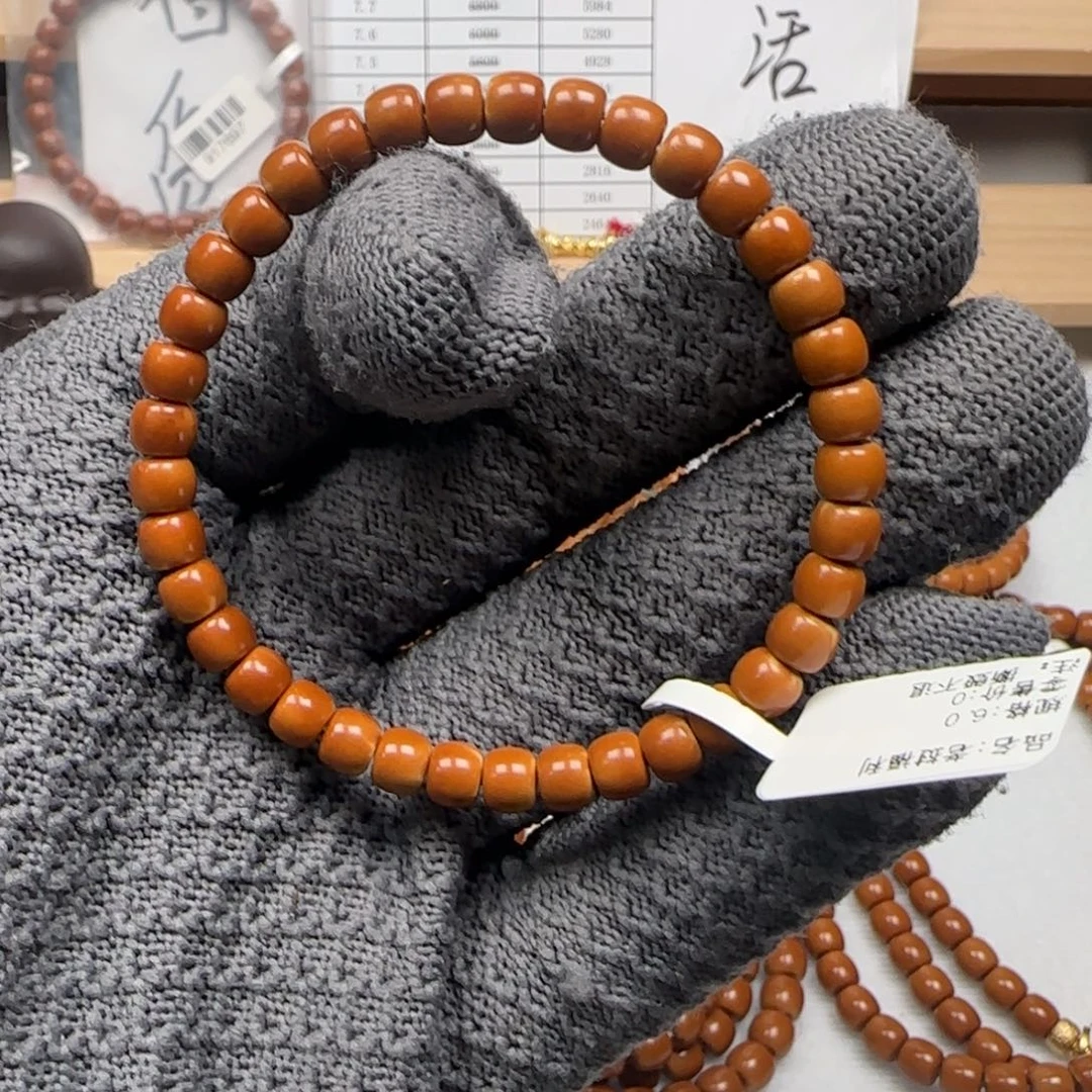 ？***橄榄核吊坠老挝6.0mm三花