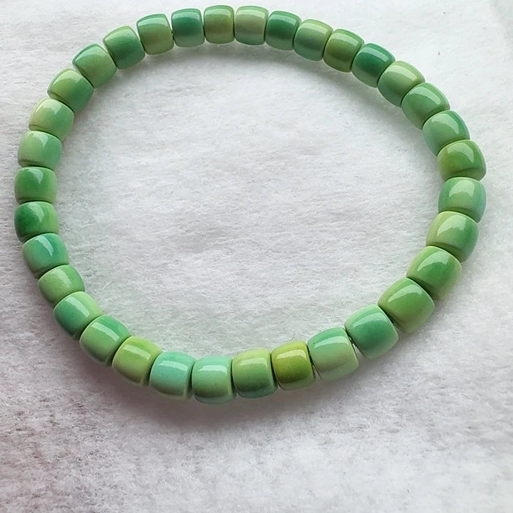 尺寸：6/5➕青黄直切桶珠手串