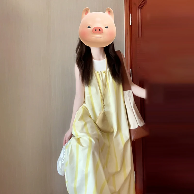 4197海边度假黄色条纹挂脖吊带连衣裙子女装2025新款夏季法式长裙