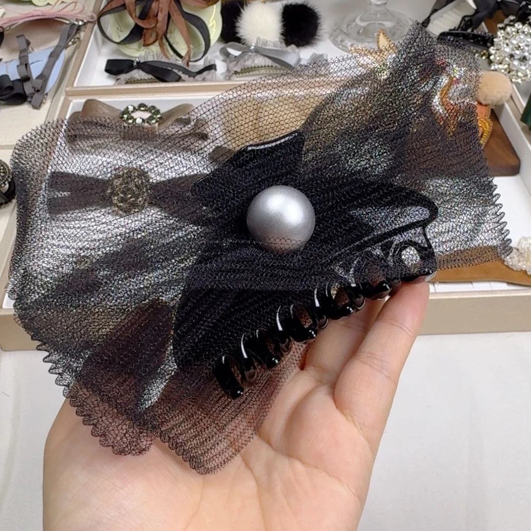 布艺非金属设计师款抓夹