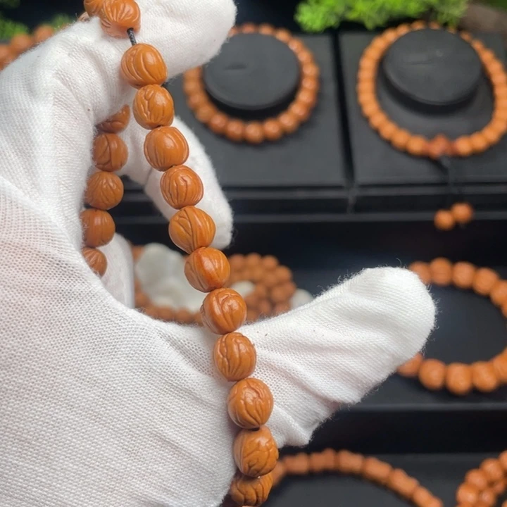 凡***夫木质类精品桃核脖挂