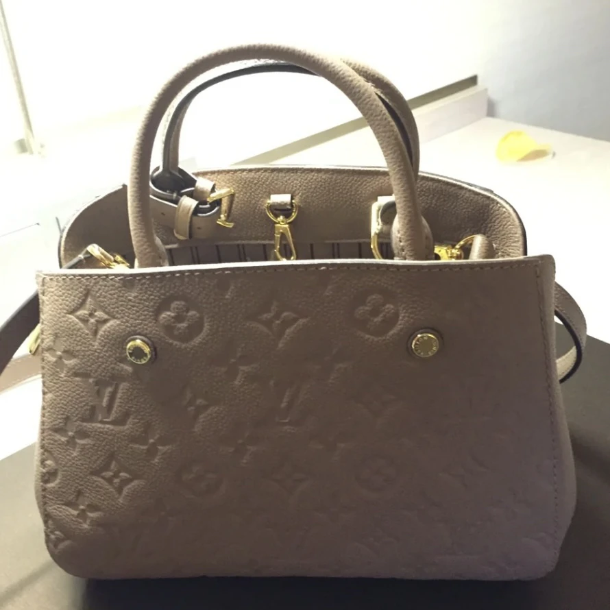 99新 LouisVuitton/路易威登 可乐/LV压纹蒙田/95新/13522123