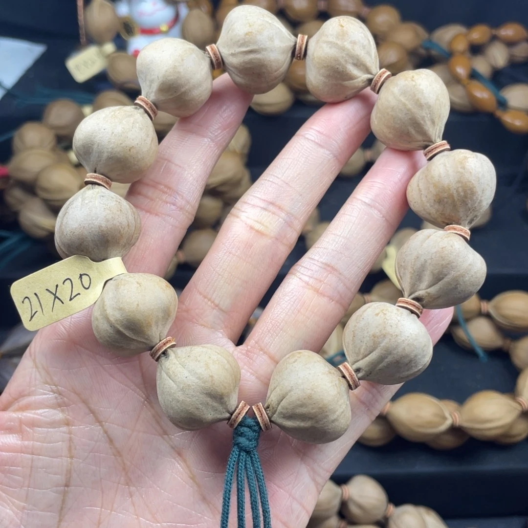 锅***铁001橄榄核三花21*20