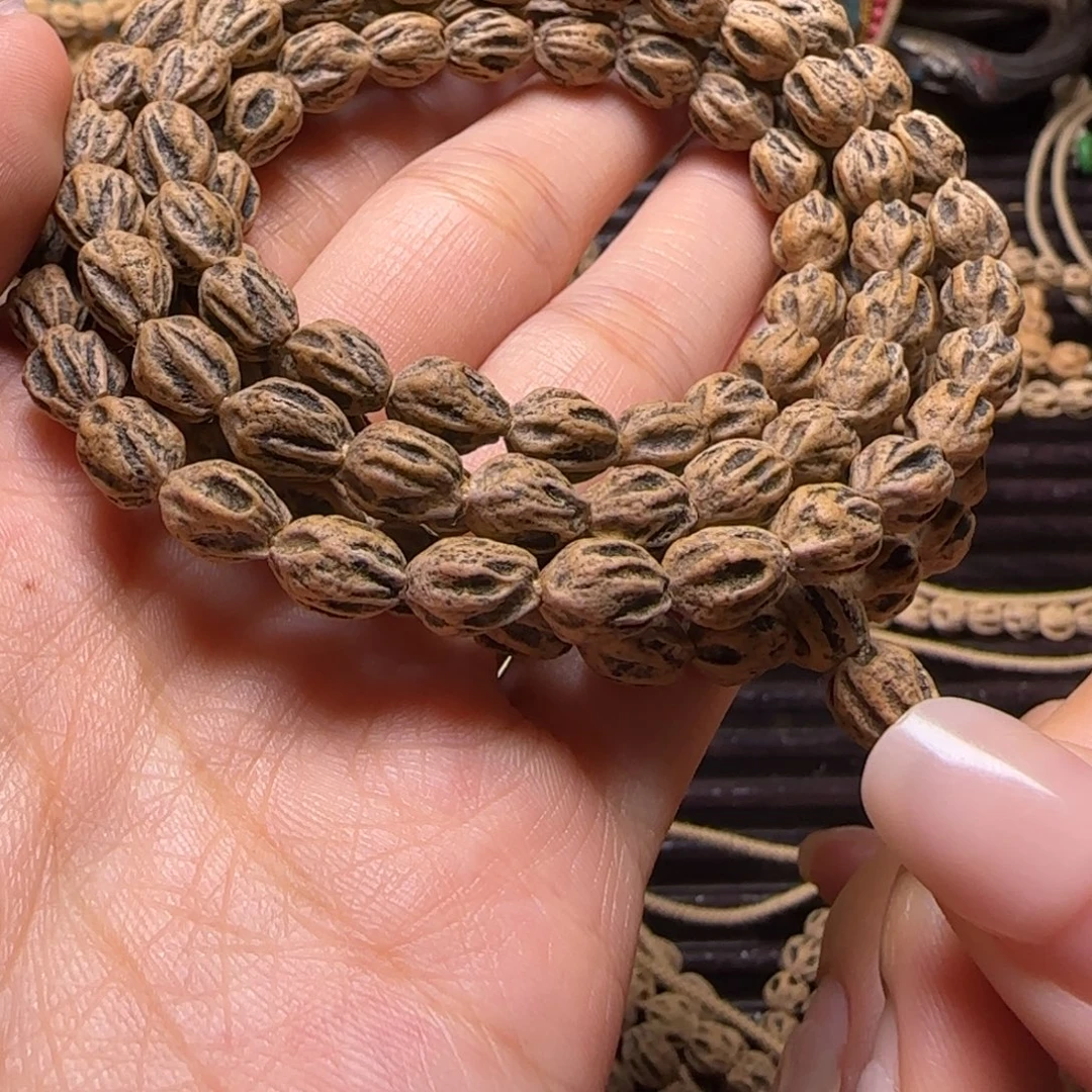 揉***啦柏香籽/百香籽吊坠