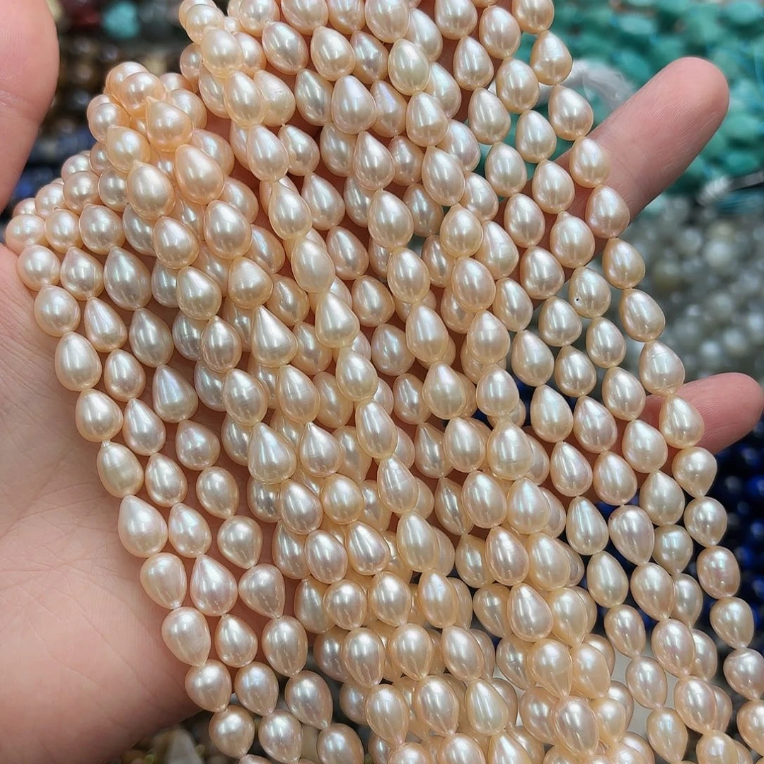 玛瑙/玉髓未镶嵌珠宝半成品6-7香槟水滴珍珠一条