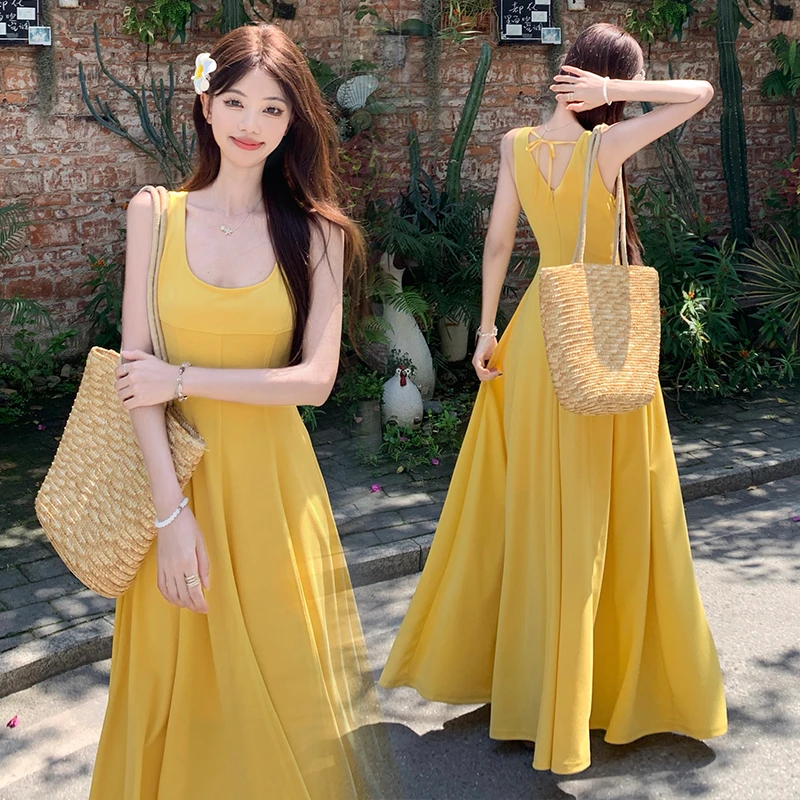 夏季新款法式茶歇方领吊带连衣裙a字背心裙复古收腰大码黄色长裙