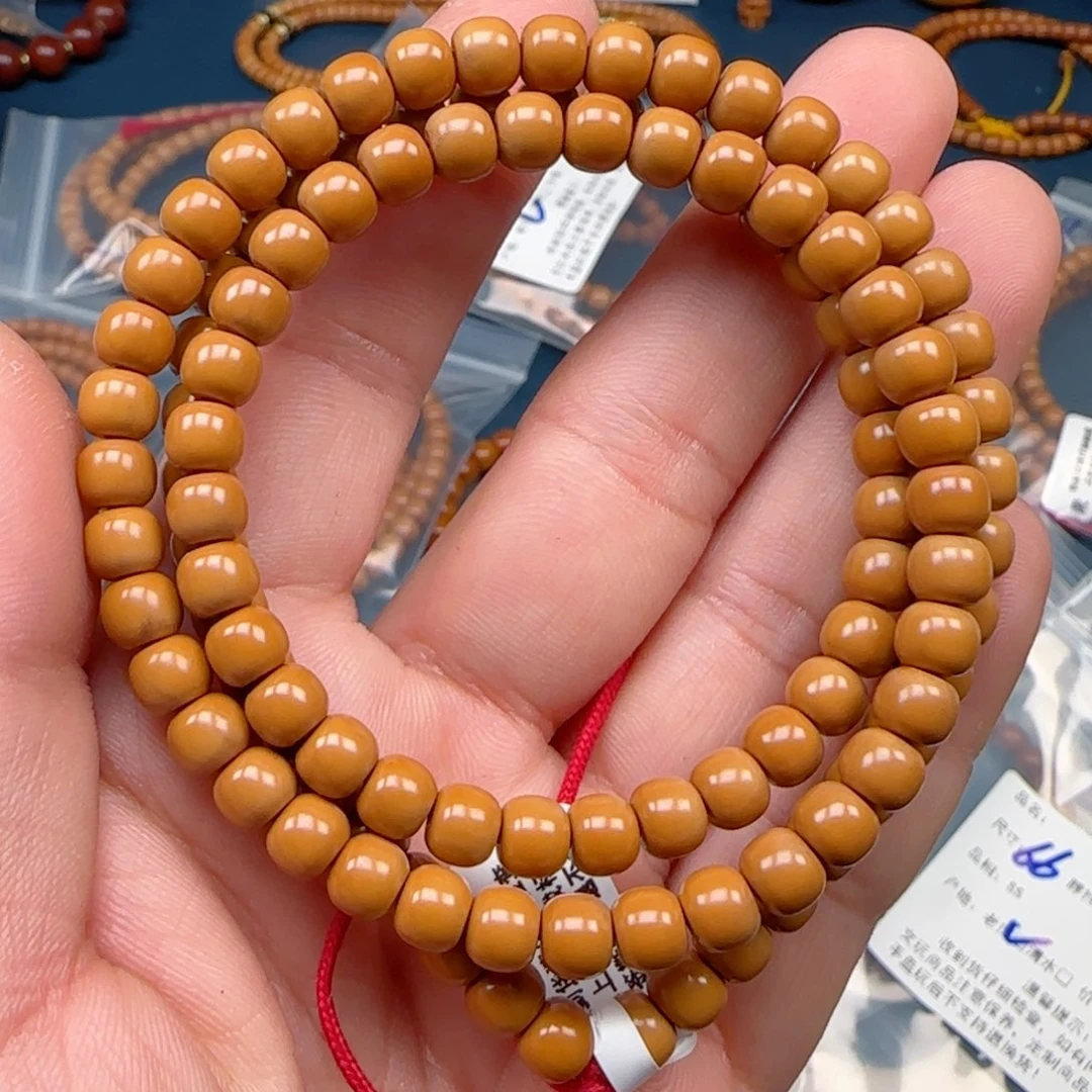 手串橄榄核老挝SS级核尖极限弧尺寸6.6×110颗全无白